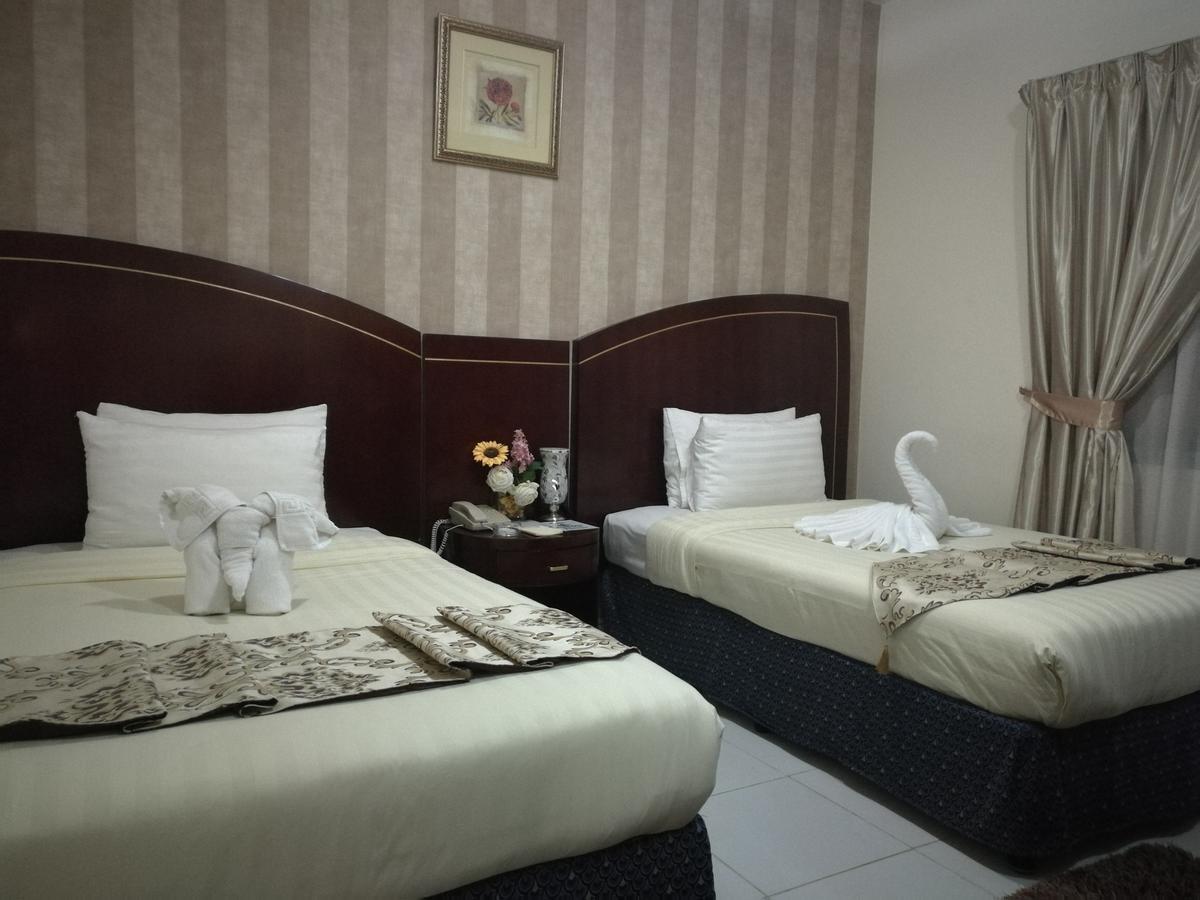 Royal Crown Suites Sharjah Buitenkant foto